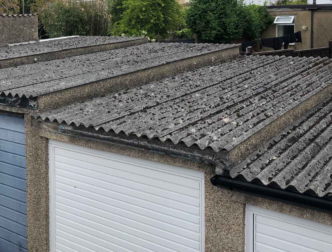 Picture of a garage with an asbestos roof