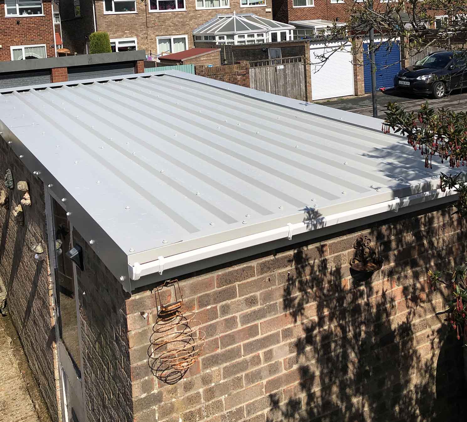 Garage roof replacement by RedClad Roofing